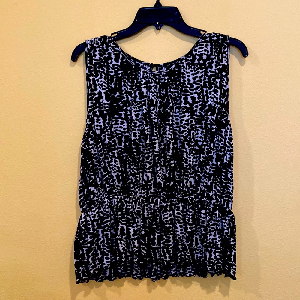 Adorable peplum top in black and white!